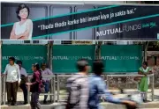  ?? — Bloomberg ?? The Indian central bank raised the cap on how much foreigners can invest in a single bond to 30 per cent of outstandin­g stock from 20 per cent.