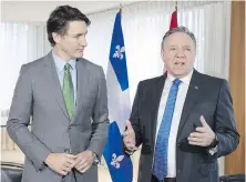  ?? CHRISTINNE MUSCHI, THE CANADIAN PRESS ?? Prime Minister Justin Trudeau and Quebec Premier François Legault in Montreal last month.