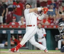  ?? Associated Press ?? Do you know this swing? It belongs to Cincinnati’s Eugenio Suarez, who led the majors by striking out 189 times in 2019. Ho-hum. A total of 157 players whiffed at least 100 times in the most recent full season of major league baseball.