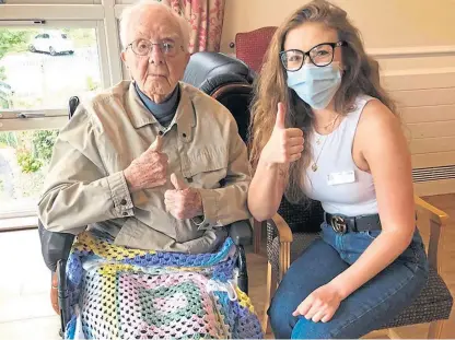  ??  ?? Balhousie Pitlochry resident George Greig with activities co-ordinator Pavlina Pajorova.