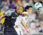  ?? The Associated Press file ?? New Lights FC forward Omar Salgado, right, during his stint with the Vancouver Whitecaps of MLS in 2011.