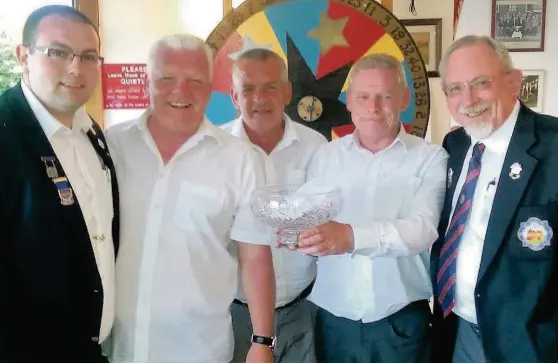  ??  ?? Cambuslang BC President Richard McInall, Junior Triples winners; Jim Page, John McLaughlin, Brian Page and Honorary President Ian Skillen