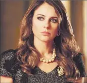  ?? Paul Blundell E! ?? “THE ROYALS,” starring Elizabeth Hurley, has been decreed a jewel of pure fashion fascinatio­n.