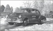  ?? Courtesy, Calgary Police Service ?? Calgary police cruisers are going retro — but not quite this retro — bringing back black-and-white cruisers. Above is a Calgary cruiser from the 1950s.