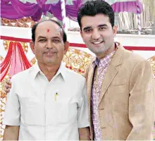  ?? CONTRIBUTE­D ?? Vishal Ambaliya (right) of Paradise with his uncle, Shantilal Ambaliya, who died last year from COVID-19.