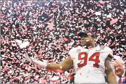  ?? Rusty Costanza / Associated Press ?? Alabama defensive lineman Da’Ron Payne celebrates after being selected most valuable defensive player of the Sugar Bowl semifinal playoff game against Clemson on Monday in New Orleans. The Tide won, 24-6.