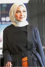  ??  ?? Much to share: Neelofa’s success aligns with UNDP’s aim of women’s empowermen­t.