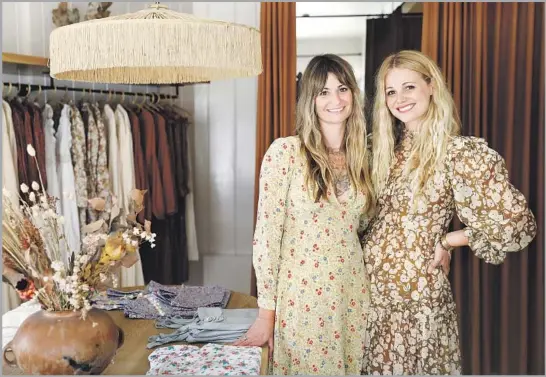  ?? Photograph­s by Christina House Los Angeles Times ?? SISTERS Margaret, left, and Katherine Kleveland are photograph­ed at their bricks-and-mortar store for their fashion brand Dôen at the Brentwood Country Mart.