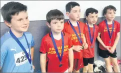  ?? ?? The U9 boys happy with their silver relay medals.