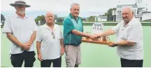  ?? Photo / Supplied ?? Kihikihi Bowling Club’s Dave Barnett presents the winning triples team, Frankton Junction, with the trophy.