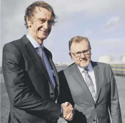  ??  ?? 0 Ineos boss Jim Ratcliffe, who is worth £21.05 billion, with Scottish secretary David Mundell at Grangemout­h