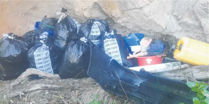  ??  ?? Kurt Salmond, of Gulf Eco Adventures, collected eight sacks of rubbish from a 100m stretch of Great Barrier Island coastline over several hours.