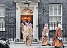  ??  ?? Members of Saudi Arabia’s Crown Prince Mohammed bin Salman’s delegation leave No 10