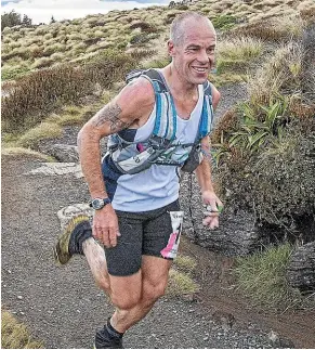  ??  ?? Te Anau police officer Dwight Grieve approaches the Luxmore Hut during the 2018 Kepler Challenge at Te Anau on Saturday. Grieve went on to finish fifth in the event. BARRY HARCOURT