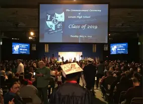  ?? THE MORNING JOURNAL FILE ?? On May 21, Lorain High School graduated its Class of 2019with 467seniors eligible to receive their diplomas. The commenceme­nt ceremony was held at the Ewing Field House of Lorain County Community College. The Lorain City School board of education members said they want the ceremony to return home to the district’s George Daniel Field athletic stadium.