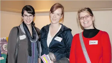  ??  ?? Karly Lagore, Christina Hamer and Mary Ann Dobson at the Ready to Frame fundraiser, where artwork produced by high school students was auctioned off.