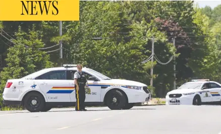  ?? RON WARD / THE CANADIAN PRESS ?? Officers are on scene near Miramichi, N.B. on Saturday where a man from Metepenagi­ag Mi’kmaq Nation was fatally shot Friday night by RCMP.