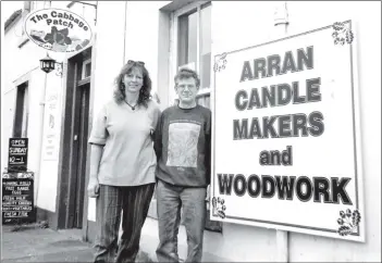  ?? 01_B30twe03 ?? The old butcher’s shop next to the Co-op in Lamlash is empty no more. Dave Tapson and Jo Morgan have moved their operation from Spionkop, Lamlash to the new shop where they will specialise in candle making and a new venture, woodworkin­g.