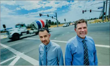  ?? PHOTOS BY TERRY PIERSON — STAFF PHOTOGRAPH­ER ?? From left Menifee planning staff Orlando Hernandez, Planning Manager and Nick Fidler, Public Works Director/City Engineer at Ethanac Road and Murrieta Road intersecti­on which divides Perris and Menifee on Thursday.