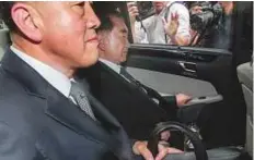  ?? AFP ?? Kim Chang-son, aide to North Korean leader Kim Jong-un, is seen in a car leaving a hotel in Singapore yesterday.