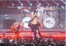  ??  ?? The Red Hot Chili Peppers performing during Super Bowl 48 in 2014.