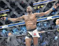  ?? AP PHOTO ?? Jon Jones reacts after knocking out Daniel Cormier during UFC 214 in Anaheim, Calif. on Saturday.