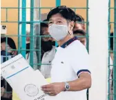  ?? JAM STA ROSA/GETTY-AFP ?? Candidate Ferdinand Marcos Jr. casts his ballot Monday at a school in Batac, Philippine­s.