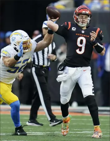  ?? Associated Press ?? Bengals quarterbac­k Joe Burrow was under constant pressure from the Chargers, who sacked him six times and intercepte­d two passes.