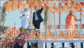  ?? HT PHOTO ?? ▪ PM Narendra Modi, French President Emmanuel Macron and UP CM Yogi Adityanath take a boat ride in Varanasi on Monday.