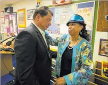  ?? Richard Brian ?? Las Vegas Review-journal @vegasphoto­graph Clark County School District Superinten­dent Pat Skorkowsky talks with CCSD Board of Trustees President Linda Young after announcing his retirement Thursday during a press conference.