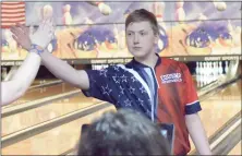  ?? GEORGE POHLY — MEDIANEWS GROUP ?? Eddie Warner of Cousino is congratula­ted after bowling a 289 game against Utica at Summit Entertainm­ent Center on Friday.