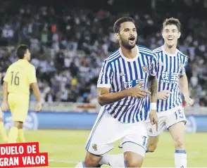  ?? EFE / Javier Etxezarret­a ?? DUELO DE GRAN VALOR El delantero brasileño William José, a la izquierda celebrando un gol, y la invicta Real Sociedad buscarán este domingo su primera victoria sobre el Real Madrid en Madrid en más de tres años.