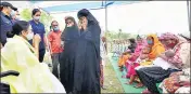  ?? ANI ?? Mamata Banerjee interacts with family members of those killed on April 10 at Mathabhang­ar on Wednesday.