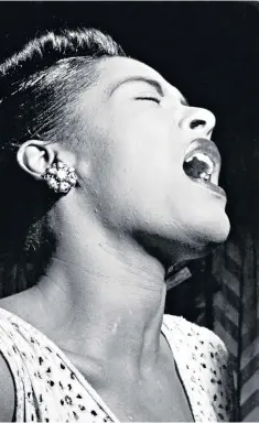  ?? ?? Singing the blues: Billie Holiday performing at Club Downbeat, in Manhattan, in 1947