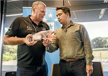  ?? LUZ ZUNIGA/ STUFF ?? National Party leader Simon Bridges, right, promised $5 million to community environmen­tal projects during the party’s BlueGreens Forum in Nelson at the weekend. He’s pictured discussing a project with an attendee.