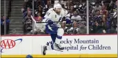  ?? JOHN LOCHER — THE ASSOCIATED PRESS ?? Lightning center Steven Stamkos (91) jumps over Avalanche defenseman Erik Johnson (6) during the second period of Game 1of the Stanley Cup Final on Wednesday.