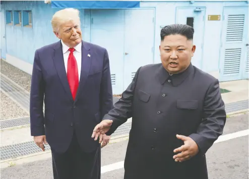  ?? KEVIN Lamarque / reuters FILES ?? U.S. President Donald Trump meets with North Korean leader Kim Jong Un at the demilitari­zed zone separating the two Koreas in 2019. Trump has convinced the UN to impose crushing sanctions on the politicall­y isolated nation.