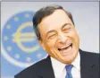  ?? Associated Press file photo ?? President of European Central Bank Mario Draghi laughs during a news conference in Frankfurt, Germany.