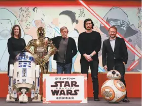  ?? Christophe­r Jue / Disney ?? Producer Kathleen Kennedy appears at a “Last Jedi” Tokyo news conference with humans Mark Hamill (center), Adam Driver and director Rian Johnson.