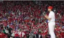  ?? Photograph: Bill Streicher/USA Today Sports ?? ‘Nothing else is really happening anywhere’: Fans wave towels as the Phillies pitcher Aaron Nola (27) prepares to throw in game four.