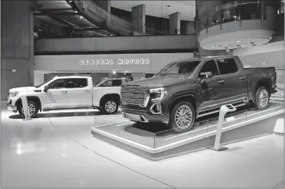  ?? [PAUL SANCYA/THE ASSOCIATED PRESS] ?? GM’S sales in the U.S. fell 1.6 percent last year, but the average sale price of the company’s vehicles hit a record $36,974.