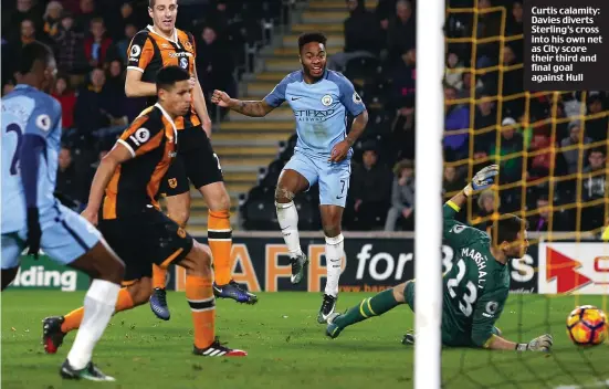  ??  ?? Curtis calamity: Davies diverts Sterling’s cross into his own net as City score their third and final goal against Hull
