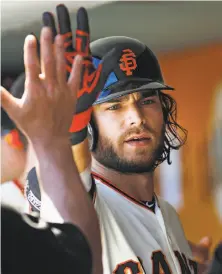  ?? George Nikitin / Associated Press ?? Shortstop Brandon Crawford said the no-trade clause in his new six-year, $75 million deal was just as important as the money.