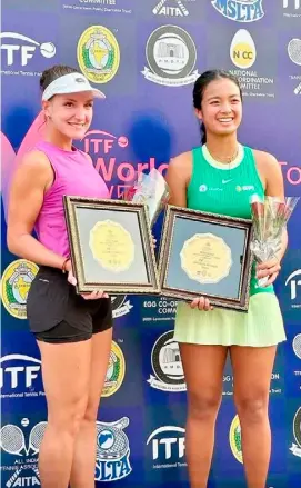  ?? PHOTOGRAPH COURTESY OF ALEX EALA/FB ?? ALEX Eala and her Latvian doubles partner Darja Semenistaj­a show off their latest hardware after winning in the W50 Pune in India.