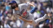  ?? DAVID ZALUBOWSKI – THE ASSOCIATED PRESS ?? Dodgers starter Tony Gonsolin allowed three runs in five innings against the Rockies to earn his 12th win of 2022.