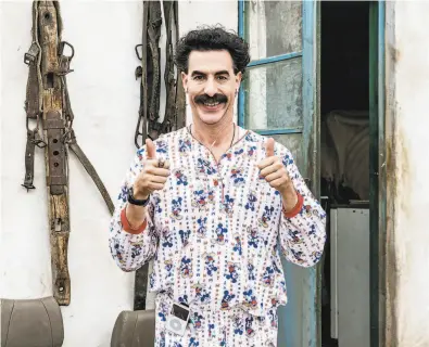  ?? Amazon Studios photos ?? Sacha Baron Cohen reprises his role as Borat in “Borat Subsequent Moviefilm,” which will be available on Amazon Prime beginning Friday. The film follows Borat on a diplomatic mission to the U. S. from Kazakhstan.