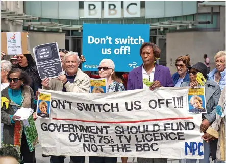  ?? Picture: DOMINIC LIPINSKI/PA ?? Anger... Demonstrat­ors made their feelings known at the BBC and 634,789 signed an Age UK petition