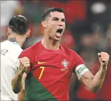  ?? REUTERS ?? Cristiano Ronaldo celebrates Portugal’s first goal against Uruguay, which was credited to Bruno Fernandes.