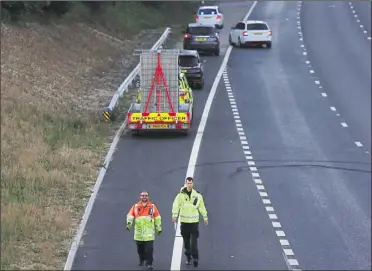  ?? Picture: UKNIP ?? Police on the M20 at Junction 10a in June last year