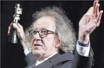  ?? Michael Sohn The Associated Press ?? Geoffrey Rush, with an award in February at the 2017 Berlinale Film Festival in Berlin, stepped down as president of Australia’s screen industry academy Saturday.